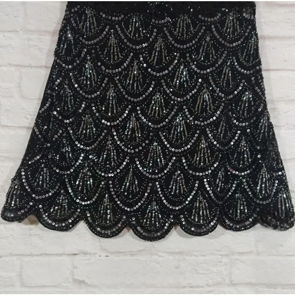 Black and silver sequin skirt size Medium. NWOT